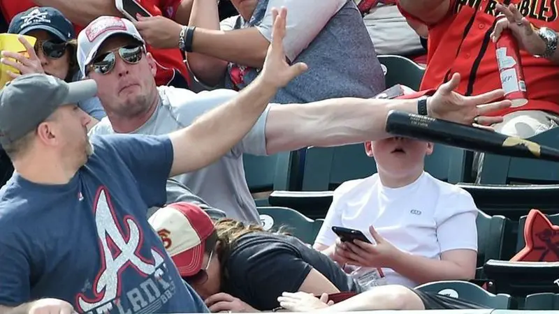 Dad saves boy from being hit by baseball bat during Spring training game at ESPN Wide World of Sports