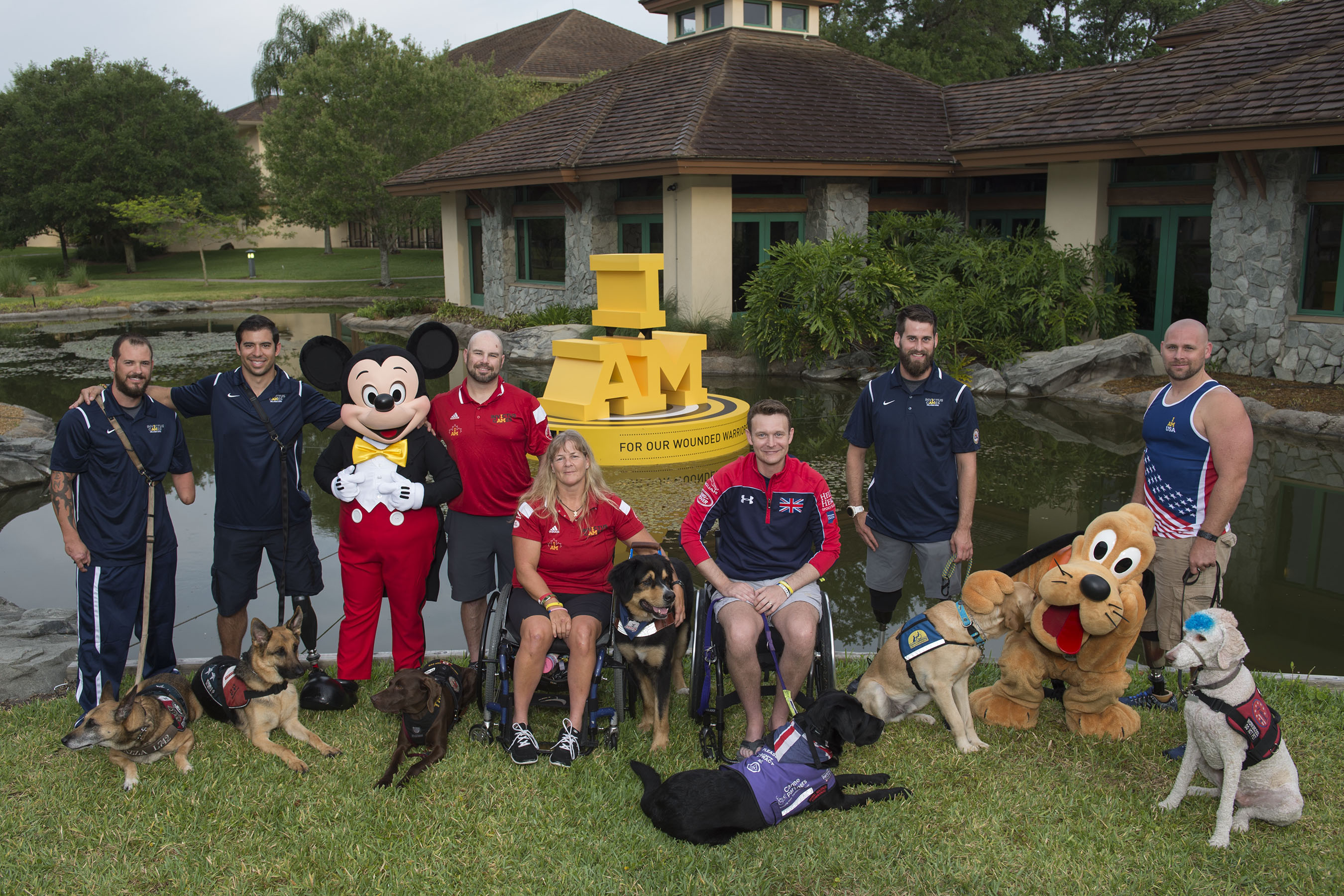 Service Dogs from the Invictus Games have a Good Day with Mickey Mouse & Pluto at Walt Disney World Resort