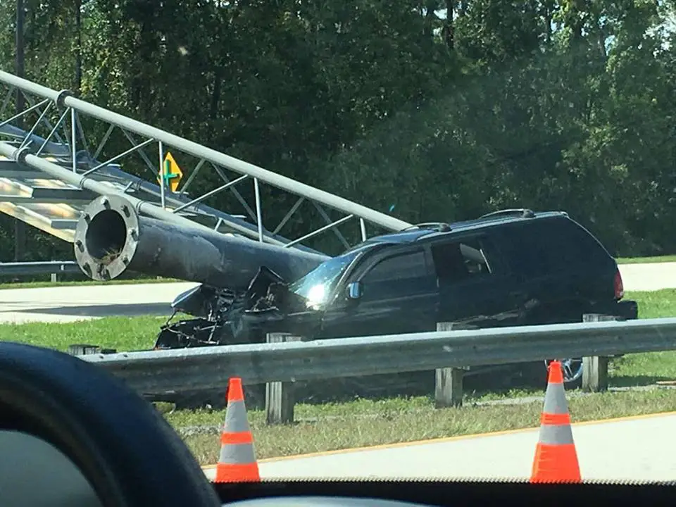 SUV Accident on World Drive brings down road sign at Walt Disney World