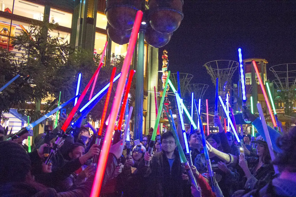 ‘Star Wars’ Fans Honor Carrie Fisher With Lightsaber Tribute At Downtown Disney