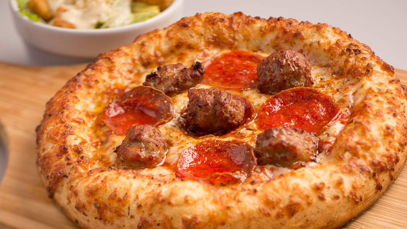 Collection of Yummy Pizzas Around the Disney Parks | Chip and Company