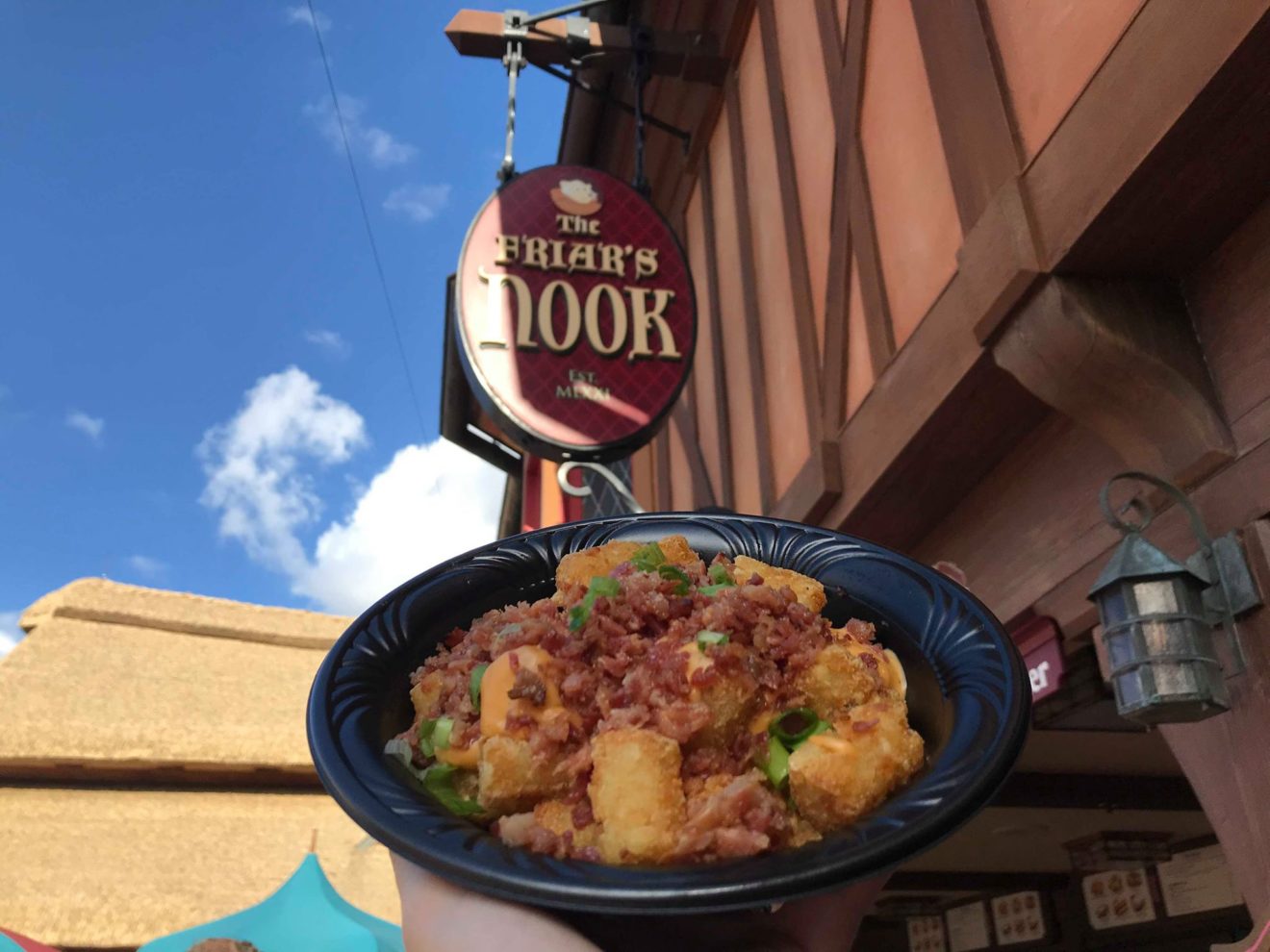 Friar's Nook In Magic Kingdom Serving Up Brats And Loaded Tots Chip