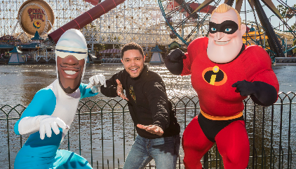 Trevor Noah strikes a pose with Mr. Incredible and Frozone at Disney California Adventure Park