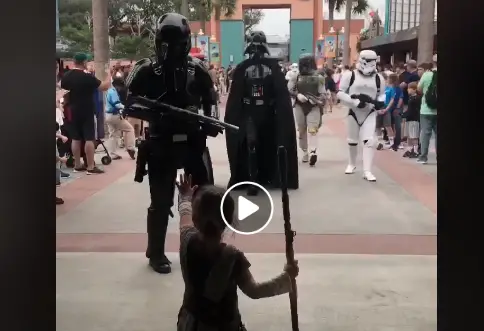 Little girl defends Star Wars Launch Bay from Darth Vader and Company