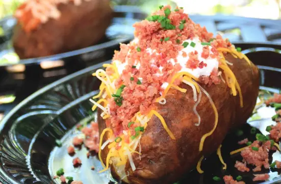 Troubadour Tavern in Disneyland offering up loaded baked potato