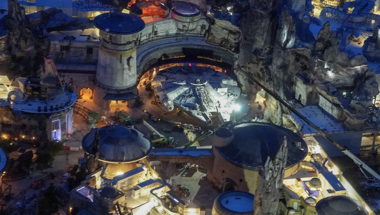 Final Construction Continues For Galaxy’s Edge At Night
