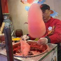 Santa Hat Cotton Candy Comes to Epcot Just in Time for the Ho Ho Holidays