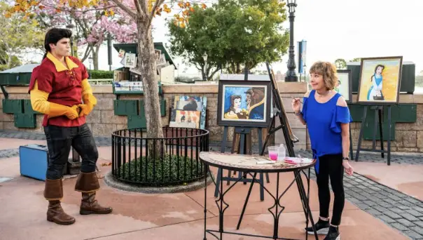 The Star of “Beauty and the Beast” Paints Gaston While Visiting Epcot’s Festival of the Arts