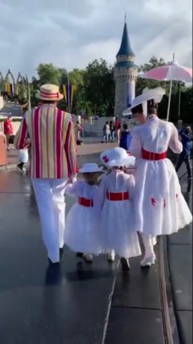 Mary Poppins and Bert Take a Stroll With Fans Dressed as Mary Poppins in Disney World