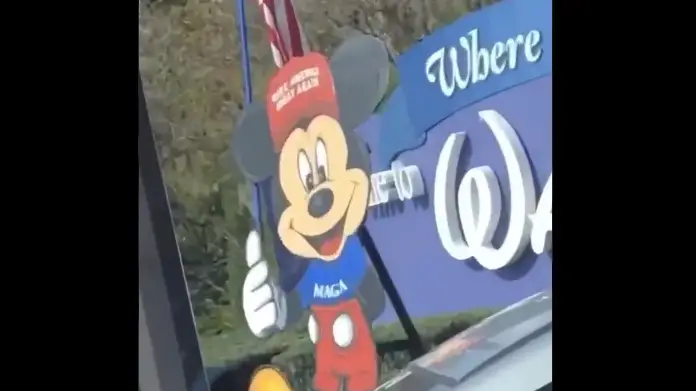 Trump supporters using Mickey Mouse for Political Signs at Walt Disney World