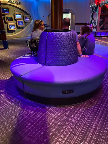 Improved Seating Area with Charging Stations in Mission: Space