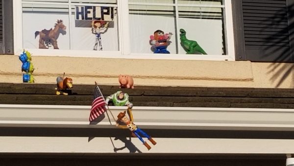 Couple uses Toy Story Characters to bring joy to Neighbors