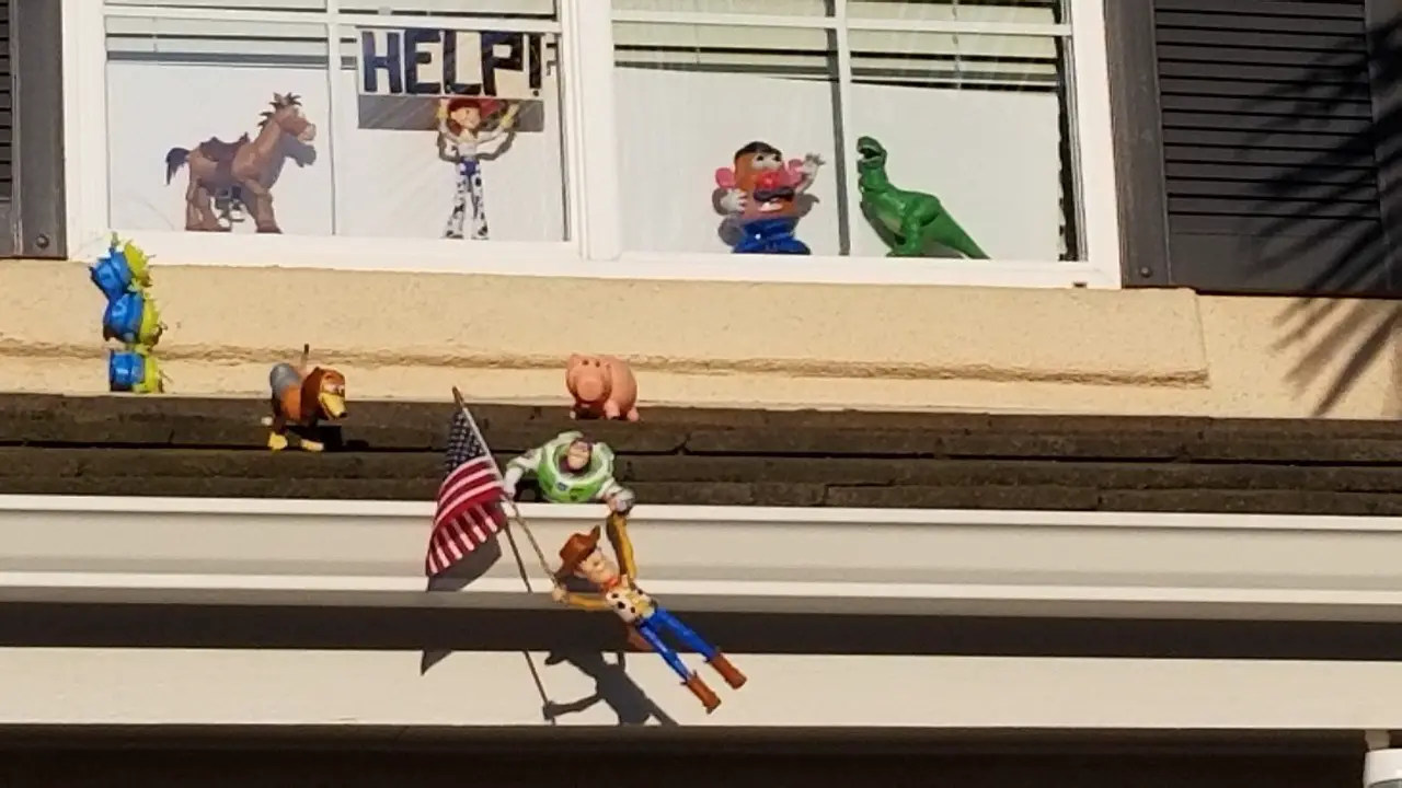 Couple uses Toy Story Characters to bring joy to Neighbors