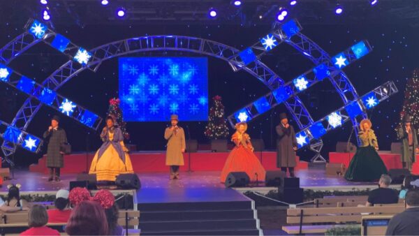 Voices of Liberty return to sing Christmas songs at Epcot's Festival of the Holidays