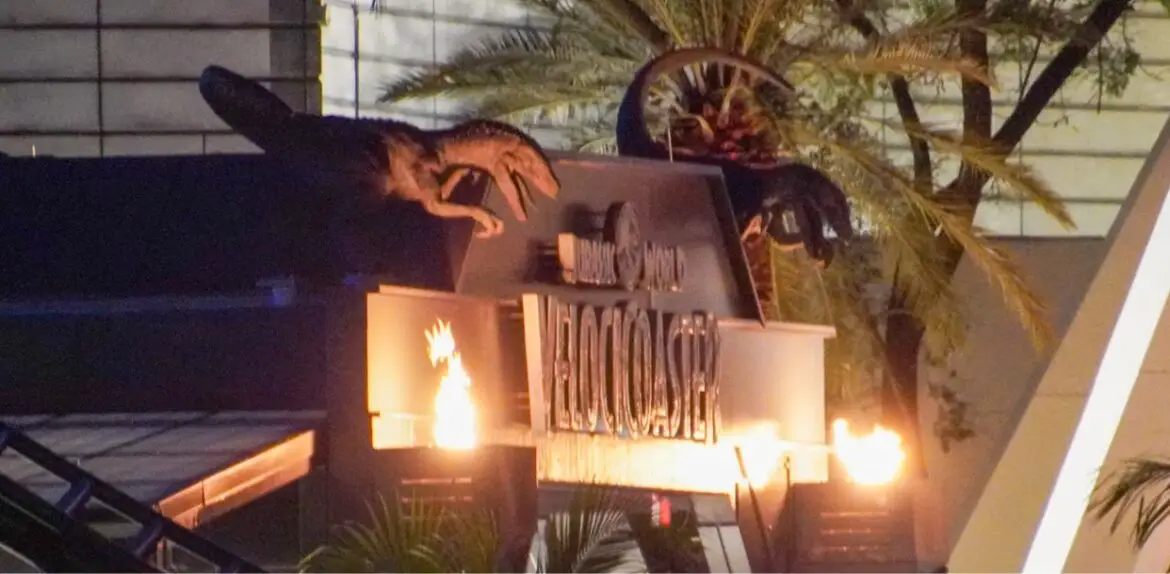 Flames Illuminating Dinosaurs at the Entrance of Universal’s VelociCoaster