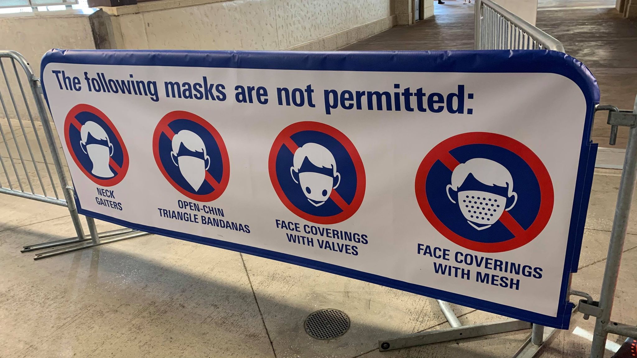 New sign shows which masks not permitted at Disney Springs