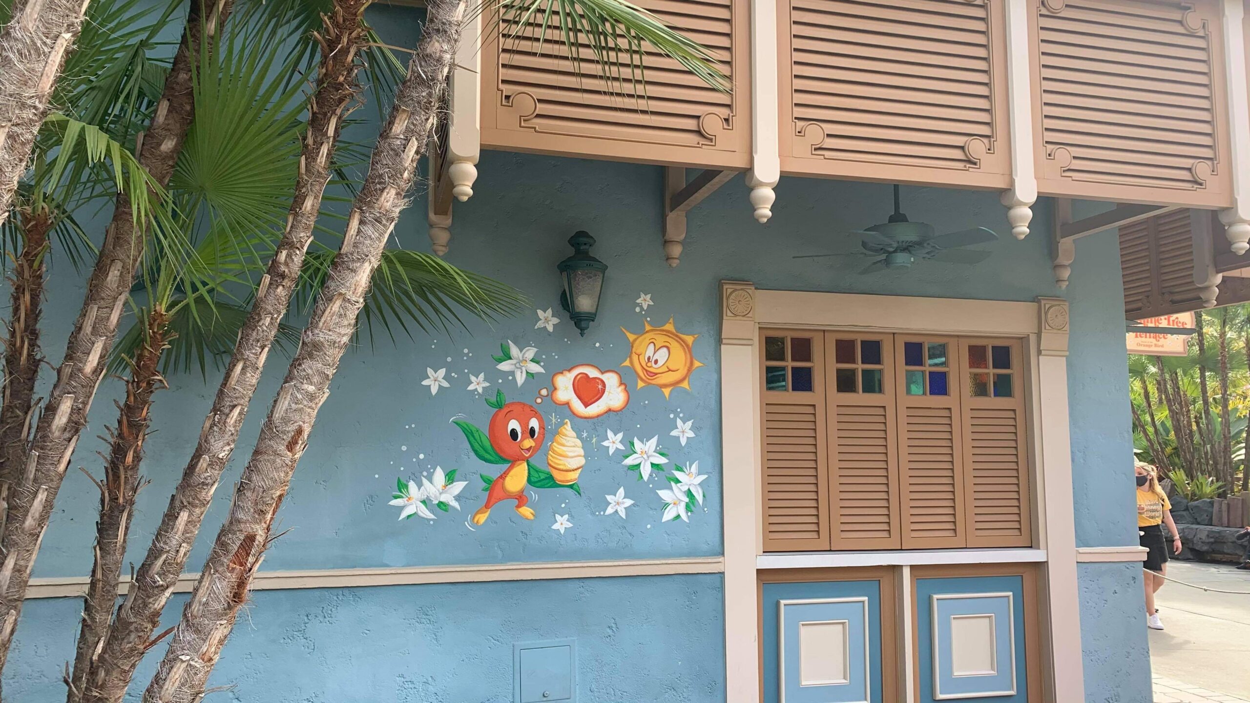 New Orange Bird Mural Flies into the Magic Kingdom Today