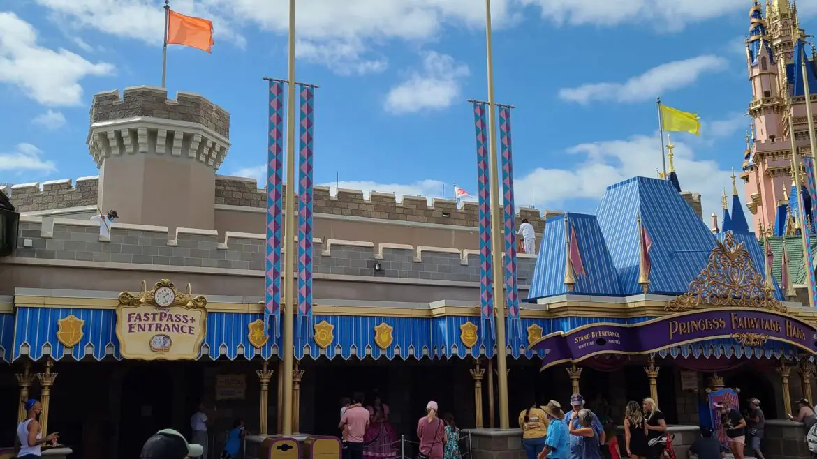 Painting continues of the roofs in Fantasyland to prepare for Disney World’s 50th