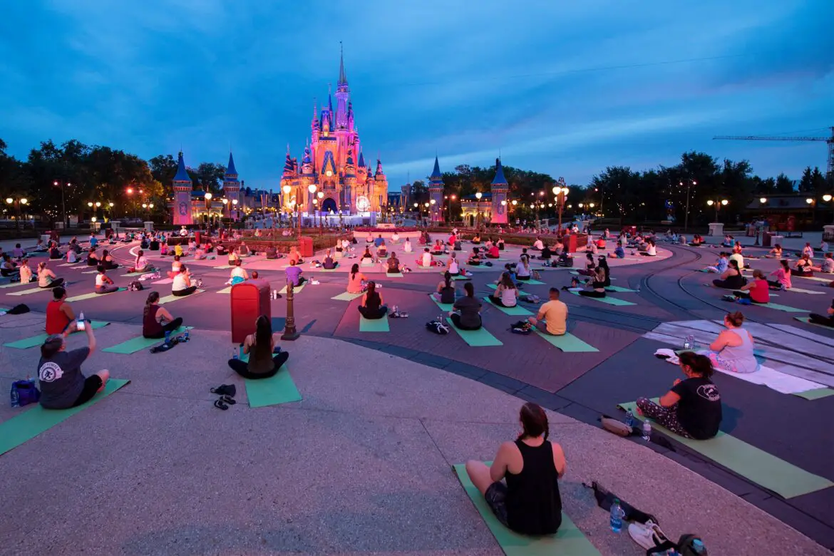 Disney Cast Members participate in Sunrise Yoga once again in the Magic Kingdom