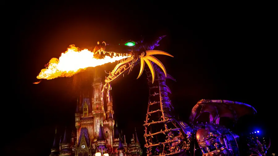 Fire-breathing Maleficent Dragon float returning to Festival of Fantasy Parade at Magic Kingdom