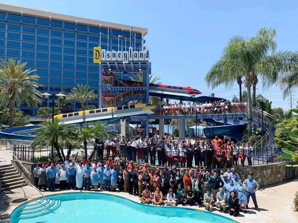 Cast Members celebrate the reopening of Disneyland Hotel