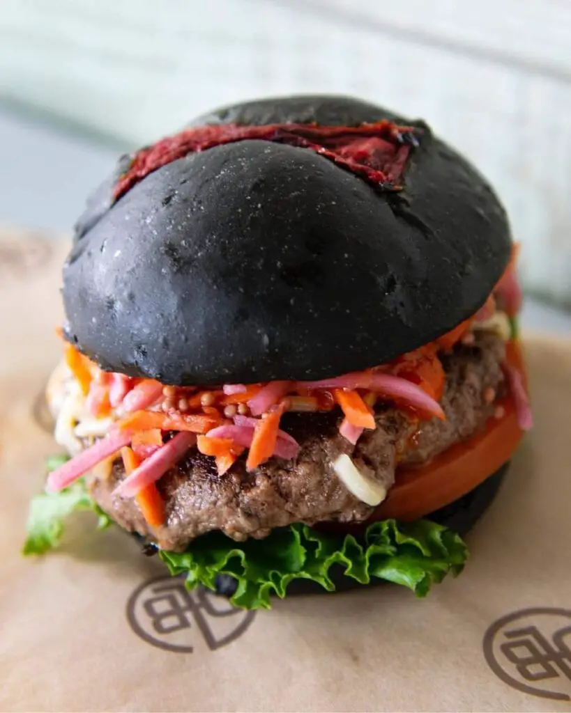 D-Luxe Burger is celebrating Black Widow with limted edition burger and dessert