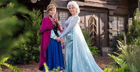 Anna and Elsa surprise guests onboard Frozen float