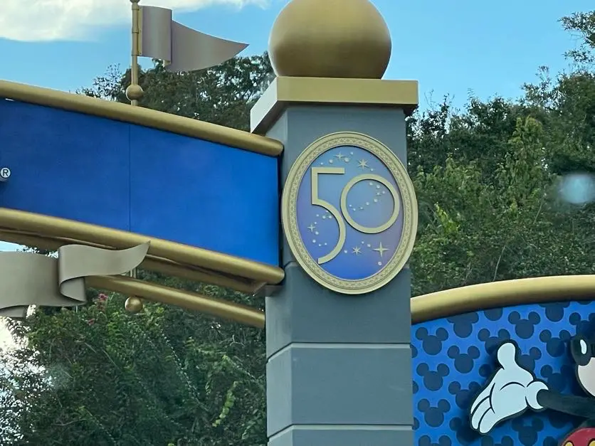 Disney World Entrance sign receives 50th Anniversary medallions