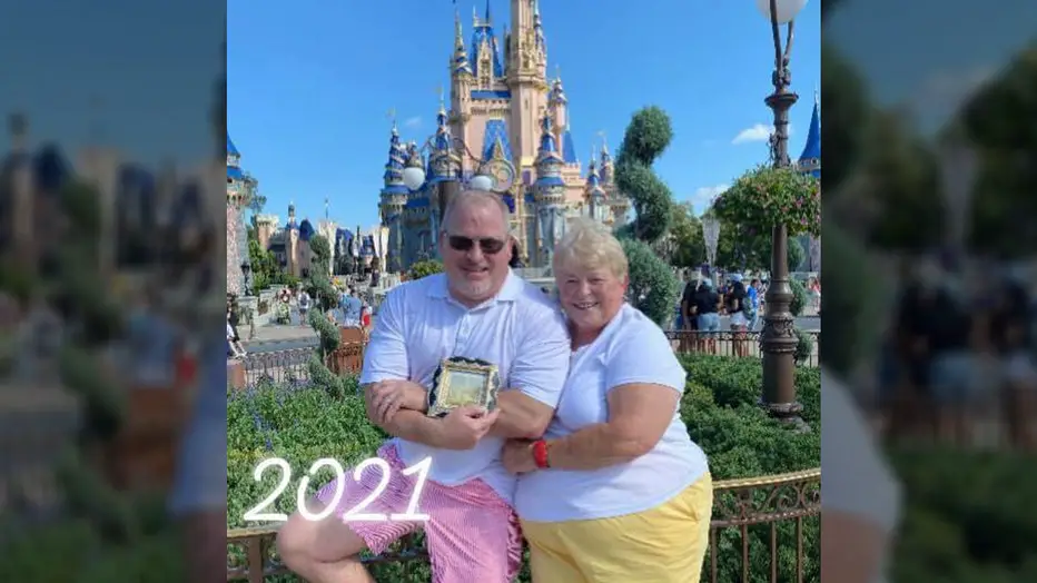 Mom & Son take an identical photo from the Grand Opening of Disney World and again 50 years later