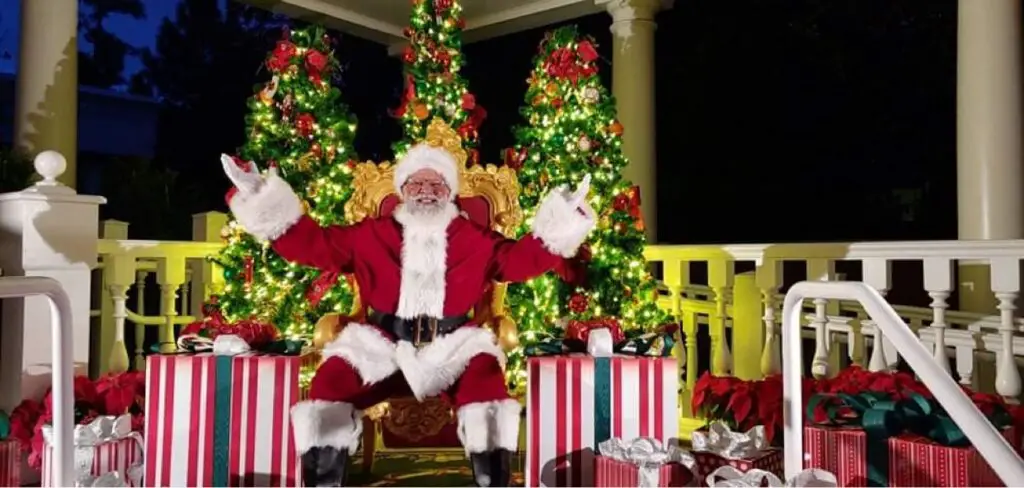 Santa of color greeting guests at Epcot's Festival of the Holidays