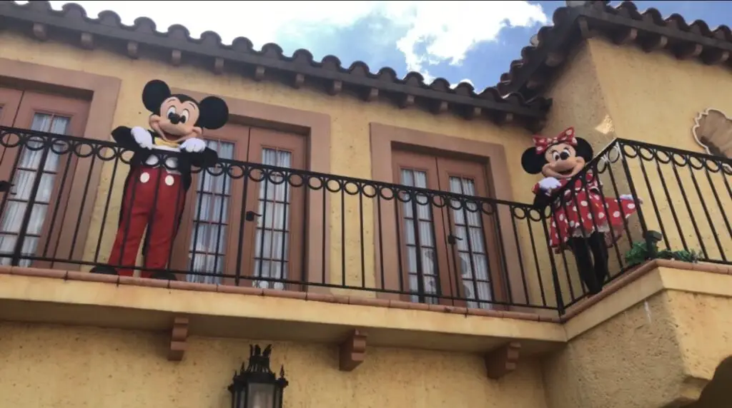 Mickey & Minnie Mouse greeting guests from high above Hollywood Studios