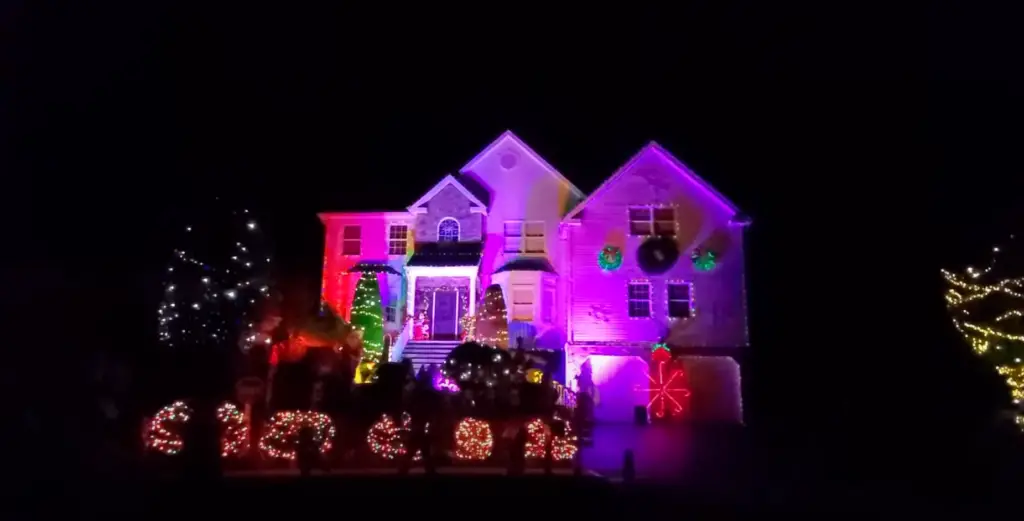 Disney Fans Recreate ‘Happily Ever After’ with Christmas Lights on their Home