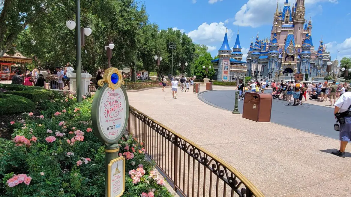 Cinderella Castle Mural of Memories advertisement in the Hub of the Magic Kingdom