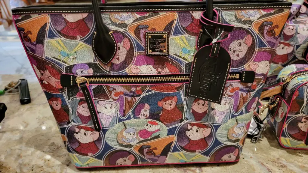 Dooney & Bourke The Rescuers Collection now available at Walt Disney World