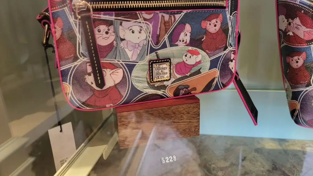 Dooney & Bourke The Rescuers Collection now available at Walt Disney World