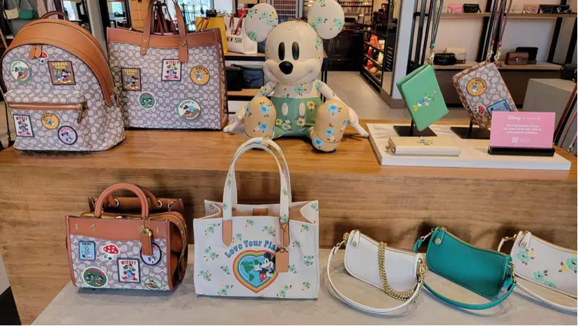 New Disney100 x COACH Collection Available At Walt Disney World!