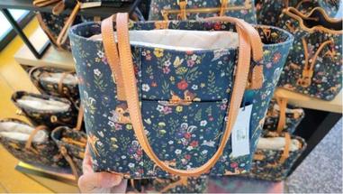 Bambi Dooney & Bourke Prances into Stores - dooney and bourke 