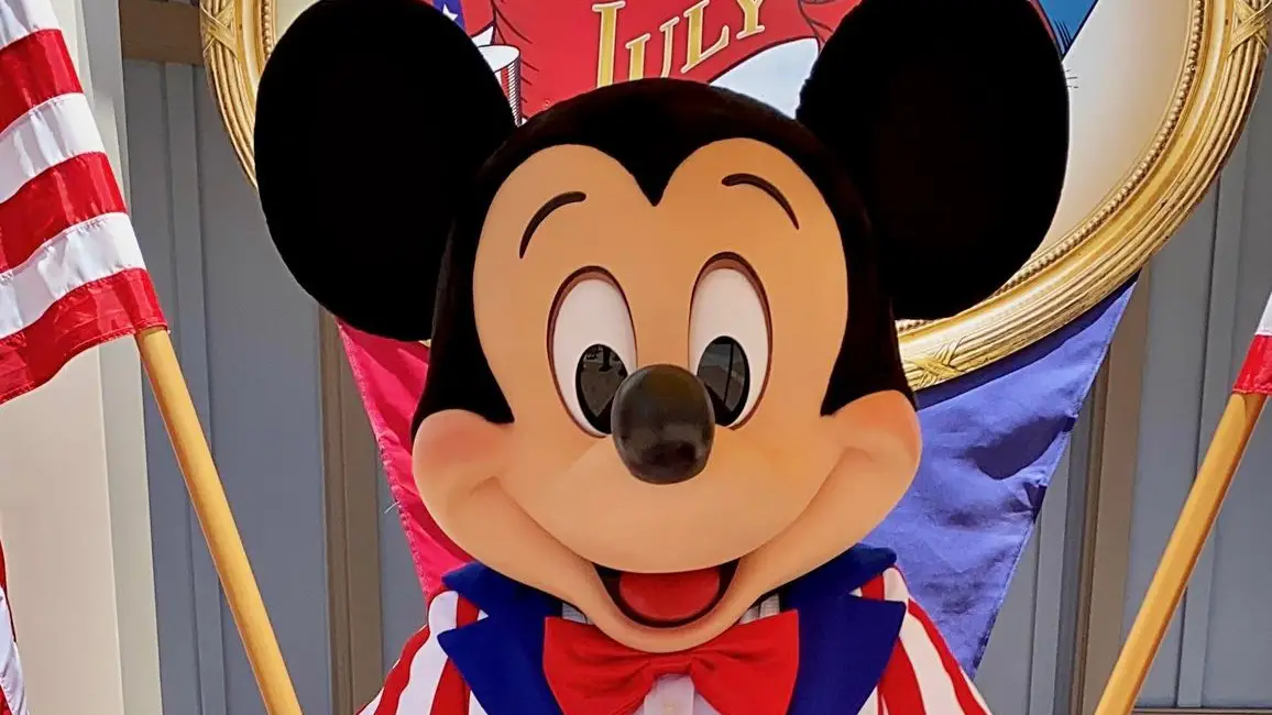 Patriotic Mickey Mouse Greeting Guests in Disneyland