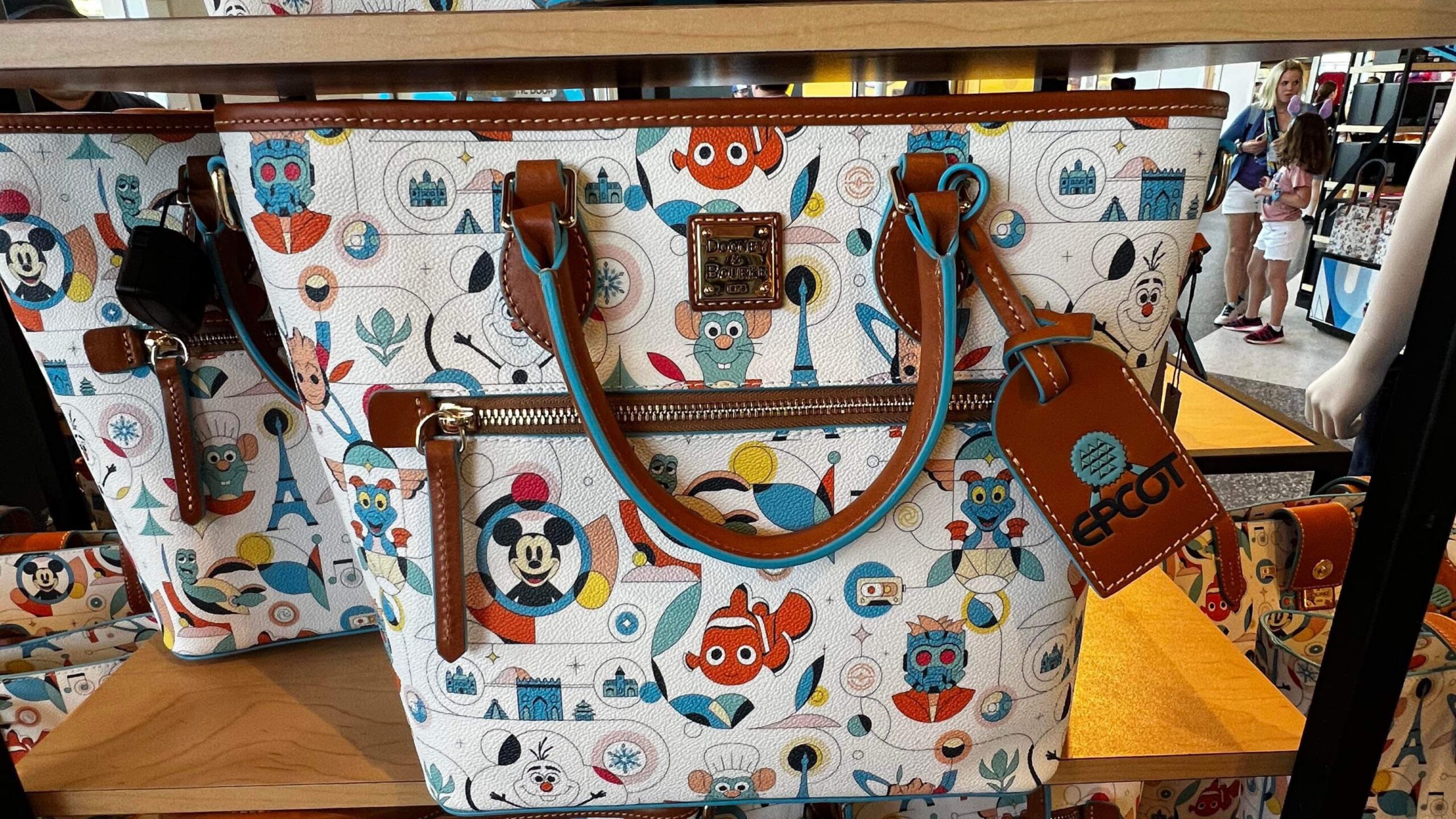 New Epcot Reimagined Dooney And Bourke Collection Spotted At The