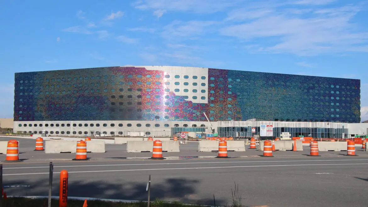 Reflective Tiles Being Placed Around The Outside Of The Stella Nova And Terra Luna Resorts