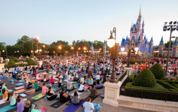 Disney-World-Cast-Members-Celebrate-International-Yoga-Day-in-front-of-Cinderella-Castle
