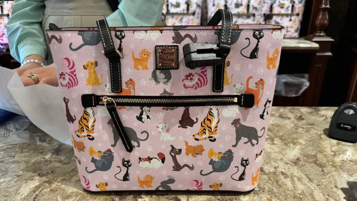 Purr-fectly Adorable: Disney Cats Dooney & Bourke Tote Bag Takes Over Magic Kingdom!