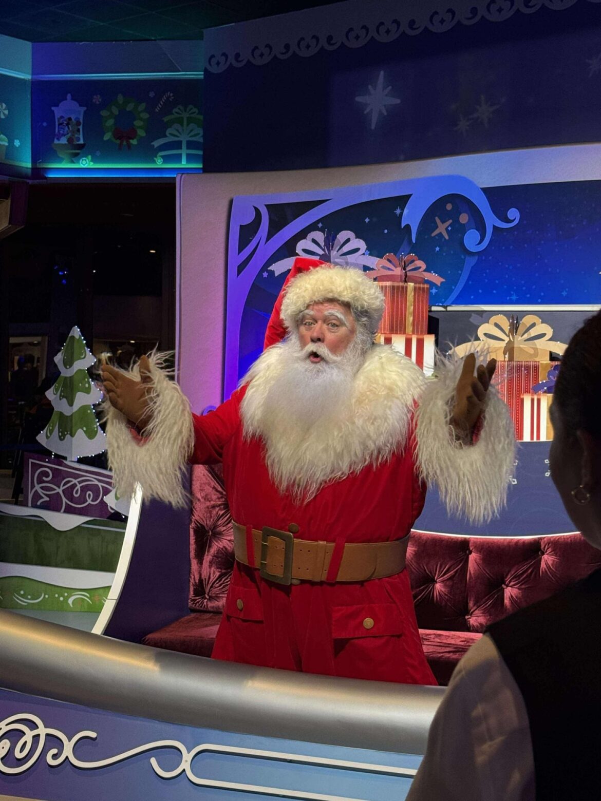 Santa Greeting Guests Inside the Odyssey Building for 2024 EPCOT Festival of the Holidays