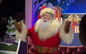 Santa Greeting Guests Inside the Odyssey Building for 2024 EPCOT Festival of the Holidays 3