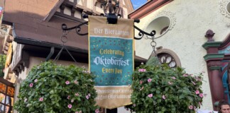 New Oktoberfest Themed Banners Installed at Biergarten Restaurant in EPCOT